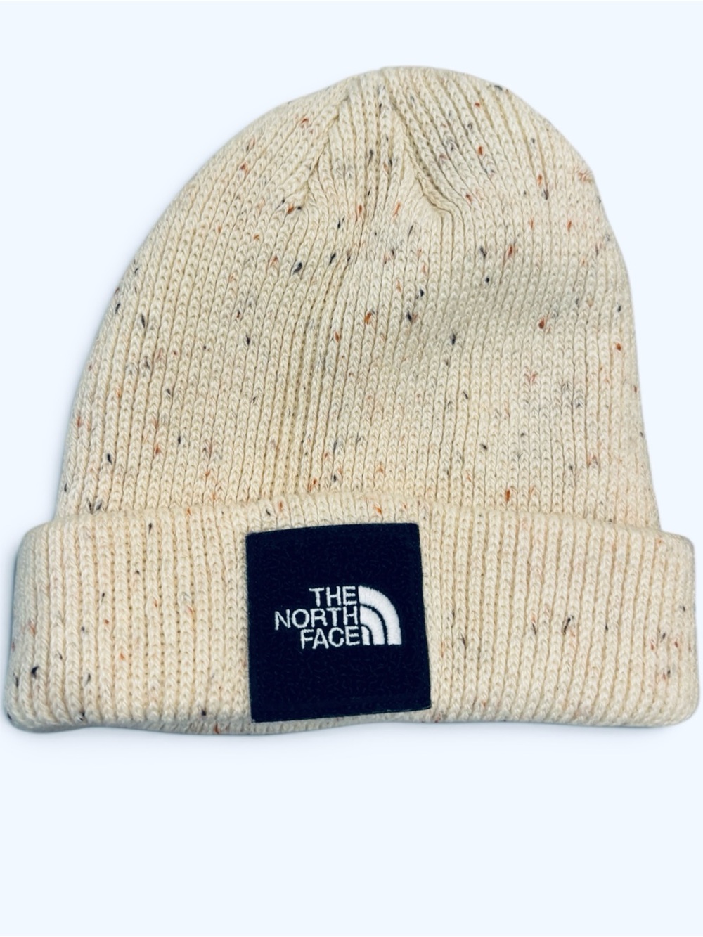 The North Face Cream Speckled Knit Beanie with Black Fuzzy Logo Patch